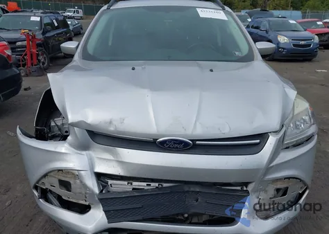 2014 Ford Escape Se z USA, uszkodzony, nr VIN 1FMCU9G90EUD91284